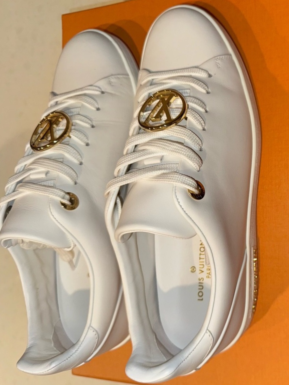 Louis Vuitton White Leather Sneakers with Gold LV Medallions